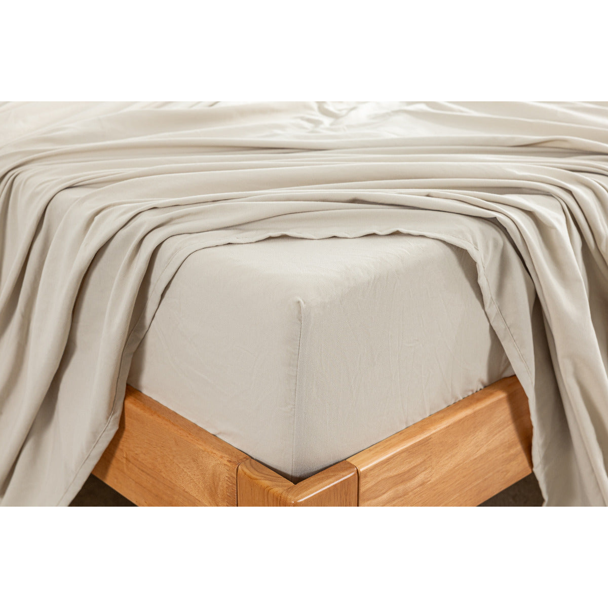 Close-up corner view of the MLILY Soft Washed Sheet Set in beige, highlighting the soft and durable materials.