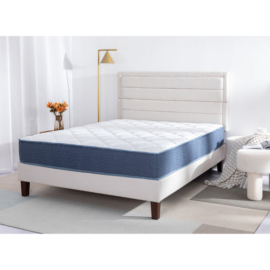 Corner view of the Doms Mattress Store ValueRest Innerspring Medium 9" Mattress on a bed frame in a bedroom