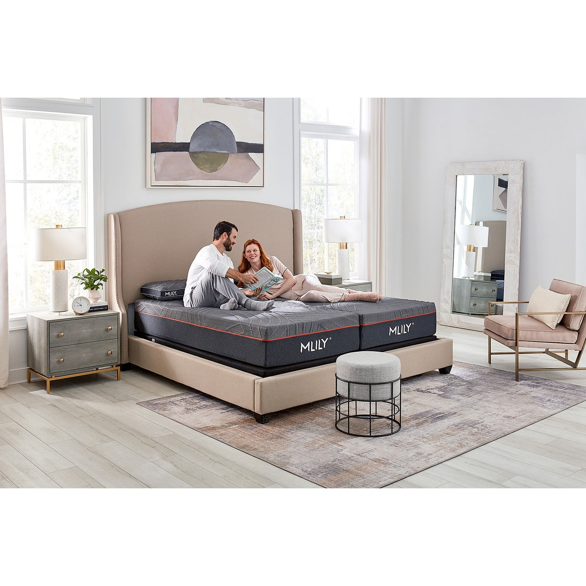 MLILY PowerCool Hybrid Medium 11.5-inch Mattress, corner view showing split mattress on MLILY PowerCool Adjustable Base, man and woman smiling, demonstrating independent use of split bed, MLILY PowerCool Pillows, decorated bedroom.