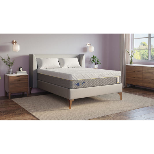 MLILY WellFlex 1.0 Memory Foam Firm 12" Mattress on a platform bed frame with a couple pillows at the head, inside a decorated bedroom, corner view showing the detail of the front and the side.