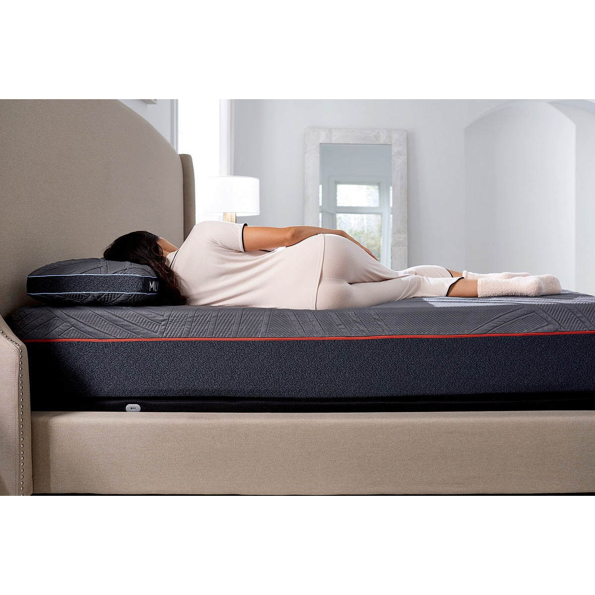 Side view of woman sleeping on MLILY PowerCool Hybrid Medium 11.5-inch Mattress, showing sleep, spine alignment, and posture benefits, using MLILY PowerCool Pillow for head, neck, and shoulder support, base flat, decorated bedroom.